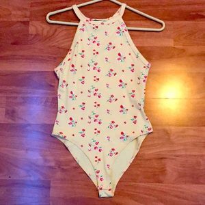Cute body suit from forever 21, unworn, no tag, size small. Yellow, red, green